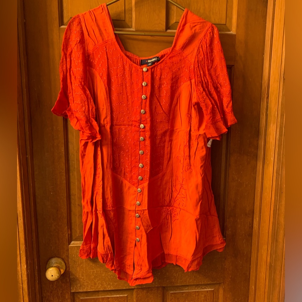 Bright orange button up blouse